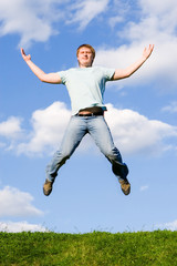 Fototapeta na wymiar happy man is jumping