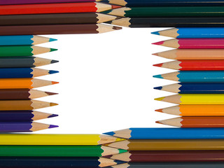 Assortment of colored pencils on white background