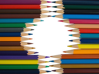 Assortment of colored pencils on white background