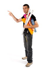 Architect with plans pointing at  white wall