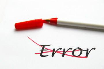 error croseed out with red ink, on white paper