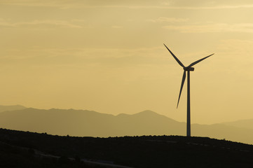 Wind power aerogenerator skyline at dusk © WINDCOLORS