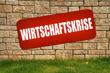 Fototapeta premium Schild an der Steinwand wirtschaftskrise