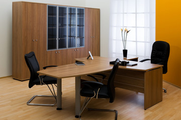 table and leather chairs