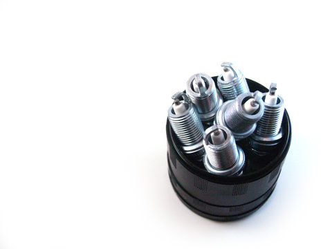 Spark plugs in container