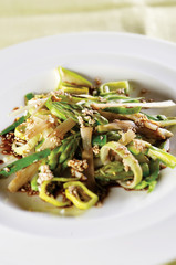 Asparagus salad with vinegar, sesame seed and onion