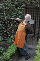 Senior in the garden with backache