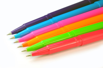 Fototapeta premium Set of multicolor pens on white background