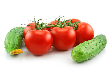 Ripe Tomatoes and Cucumbers Isolated on White