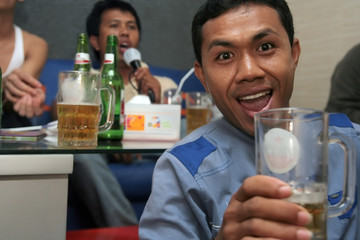portrait of man on karaoke and party