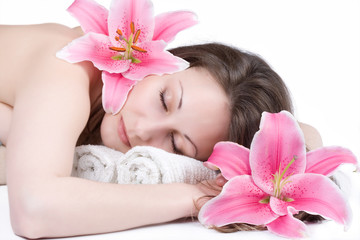 Obraz na płótnie Canvas relaxing girl with flower