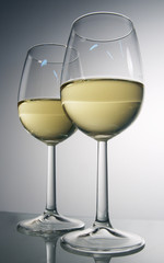 Two glasses of white wine.