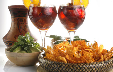 Sangria, corn chips and guacamole