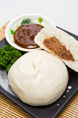 Meat stuffed bread (sioapo) with hoisin sauce
