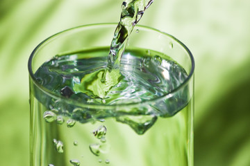 pouring water in glass