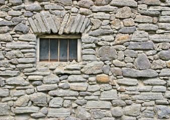 Fototapeta na wymiar The external surfaces of houses built in rocks glass