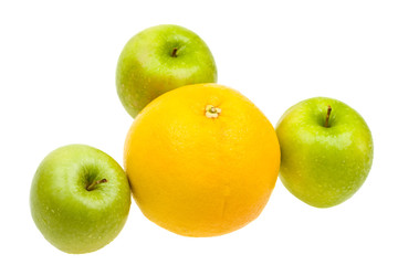 Close-up fresh apples and orange isolated on white