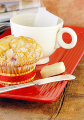 Muffin and Coffee On a Rustic Wood Table