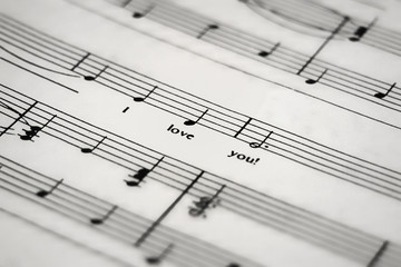 a sheet of music with the lyric I Iove you