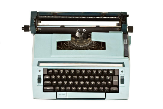 Old typewriter isolated with clipping path over white