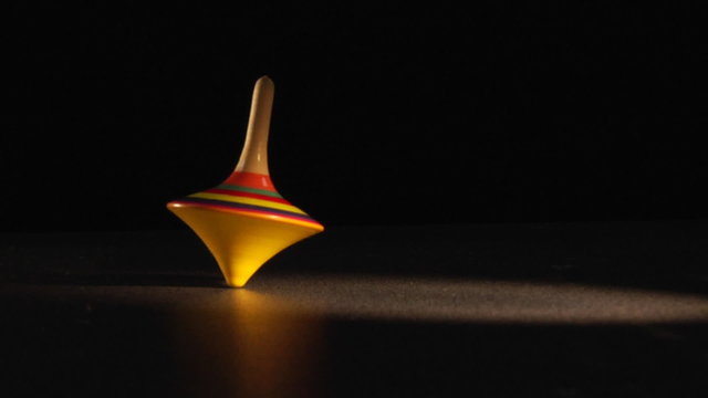 spinning top in the dark