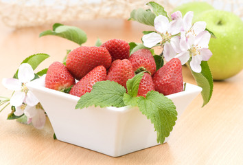 Fresh strawberries and apple
