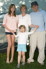 Happy family in tent