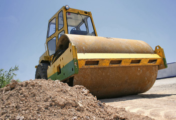 Fototapeta premium Power compactor on the road