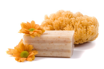natural sponge, soap and flowers