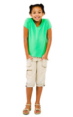 Girl standing with hands in pockets