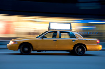 Taxi at night, with copyspace available.