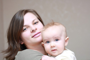 happy mother with a young baby