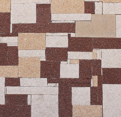 Decorative panel from different granite blocks