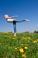 young woman exercising yoga