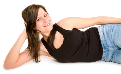 Beautiful Smiling Brunette Lying Down and Relaxing