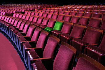 Fototapeta premium Theatrical seating and your seat stands out from the crowd