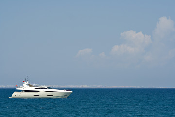 luxurious white yacht with space for text