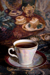 Cup of tea of ancient service in style of olden time