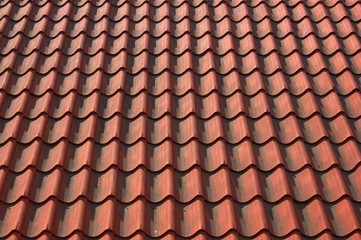 Red tiles roof background