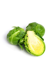 Fresh organic Brussels sprouts on white background