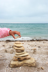 stack of pabbles over sea background