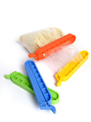 Clips for food Bags in various colors on white background