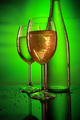 White wine under green light