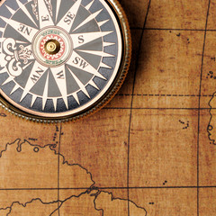Fototapeta na wymiar Old compass and map
