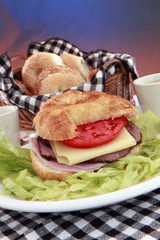 Early cranking with a croissant, deli meats and swiss cheese