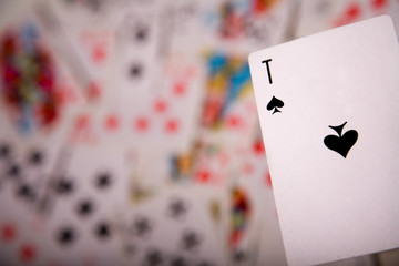 Close-up up of an ace over blurred card background