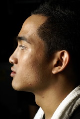 Obraz premium Asian man side profile portrait