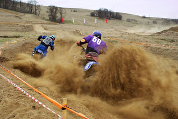 Motocross competiotin on dirty track