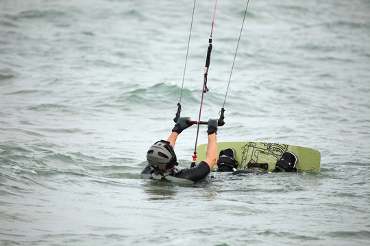 Kiteboarder ready for surfing