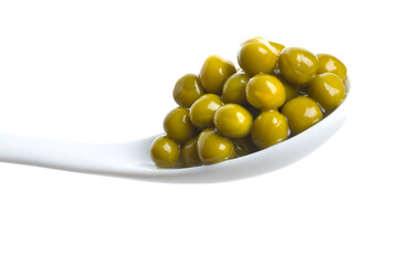 Tinned peas  in a spoon